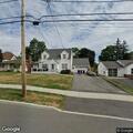 Electric wheelchair disabled in roadway on East Albion