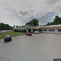 Person in car at parking lot experiencing chest pain