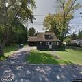 Person experiencing chest pain at 6 Raymond Street
