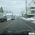Man standing in roadway blocking traffic
