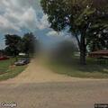 Downed power line on fire behind home