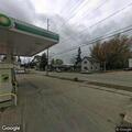 Female fallen outside gas pump with possible broken knee