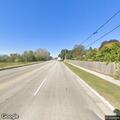 Large rocks and pothole blocking eastbound lane
