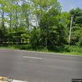 Vehicle off road with light smoke on Route 104