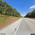 Driver tailgating motorcycle and passing unsafely
