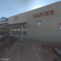 Person camping behind store bothering customers
