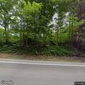 Tree on low hanging wires over road on State Route 26