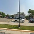 Young woman losing consciousness at restaurant