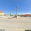 Stolen vehicle with armed occupant found at gas station