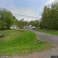 Trees and wires blocking County Route 11 roadway