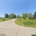 Two men fighting on roadside near trailer park