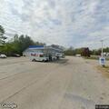 Hit-and-run sideswipe crash damages work van