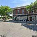 Suspicious man photographing elderly woman