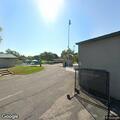 Man lying in grass awakened at Pocket Park creekside
