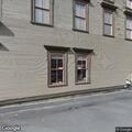 Vehicle hits retaining wall on Main Street