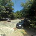 Tree branch damages parked vehicle sunroof