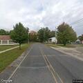 Female found lying face down near barn in Howard City