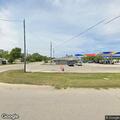 Officer checks Jeep after swerving near gas station
