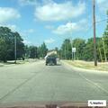 Officer checks gray Ford Fusion on M-37