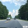 Erratic blue pickup reported on Route 11 eastbound