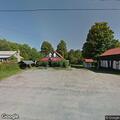 Unconscious intoxicated woman breathing at tavern