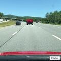 White Jeep parked off side of I-87 on-ramp