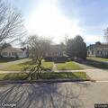 Officers check 911 open line at Main Street home