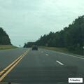 Moving vehicle on highway reported on fire