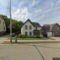 Neighbor dispute over yard work at Mill Street home
