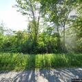 Contained brush burning monitored by homeowner