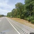 Vehicle with flat tire on I-93 near Exit 20