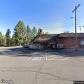 Unconscious woman fell near Gilchrist liquor store