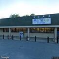 Unresponsive woman breathing in running vehicle at Rite Aid