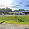 Person possibly overdosing in running car at gas station