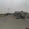 Person experiencing chest pain at gas station