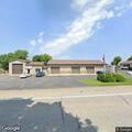 Intoxicated man reported at auto body shop parking lot