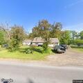 Smoke odor reported in attached garage on Peck Road