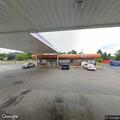 Intoxicated male passed out at Next Door Food Store