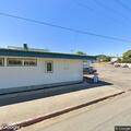 Previously trespassed woman behind store AC unit