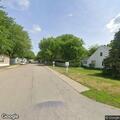 Person banging on door near Evelyn Court in Essexville