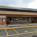 Officer checks vehicle in Hannaford parking lot