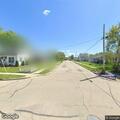 Go-kart driving repeatedly on city street