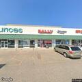 Officer checks trespassing report at business