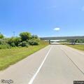 Disabled car with flat tire on US-127