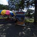 Person choking at fairgrounds but breathing and vomiting