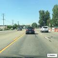 Person injured on pavement at Glenwood and Back Stretch