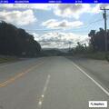 Woman in red SUV suffers abdominal pain and dizziness