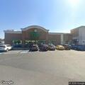 Person passed out in black BMW SUV at Dollar Tree