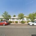 Person experiencing severe back pain at assisted living