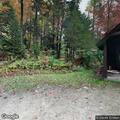 Woman with abdominal pain at state park campsite
